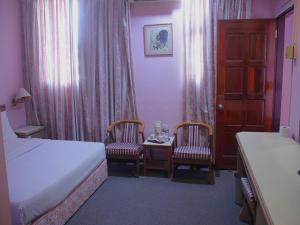Postel nebo postele na pokoji v ubytování Hotel O Hotel Ramai