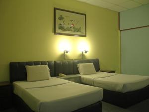 Postel nebo postele na pokoji v ubytování Hotel O Hotel Ramai