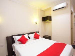 Postel nebo postele na pokoji v ubytování OYO 43915 T P Hotel + 31 fotografií