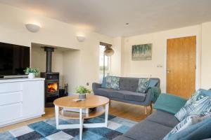 Χώρος καθιστικού στο Harrier Lodge - Lake house