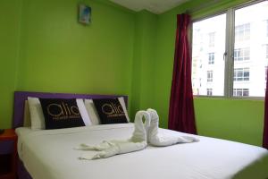 Postel nebo postele na pokoji v ubytování Hotel O Brickfields Park Hotel