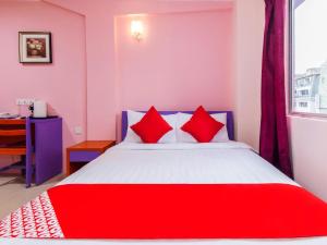 Postel nebo postele na pokoji v ubytování Hotel O Brickfields Park Hotel