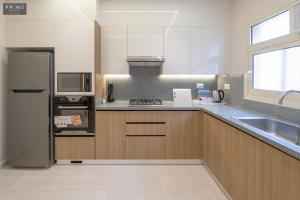 Kuchyň nebo kuchyňský kout v ubytování Prime Residence Zayed Heights + 37 fotografií