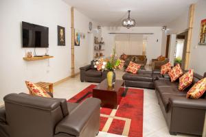 Posezení v ubytování White Guest House -Kakiri