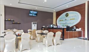 TV a/nebo společenská místnost v ubytování Collection O Hotel Igloo + 37 fotografií