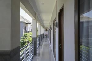 Fotografie z fotogalerie ubytování Super OYO Capital O 2166 Elitya Stay v destinaci Sanur