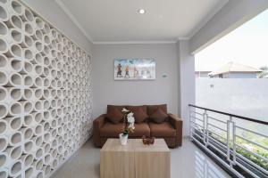 Posezení v ubytování Super OYO Capital O 2166 Elitya Stay