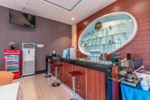 TV a/nebo společenská místnost v ubytování Collection O Hotel Igloo