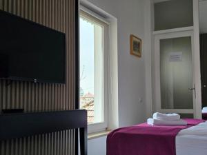 Sjónvarps- og/eða afþreyingartæki á Hotel Hecco