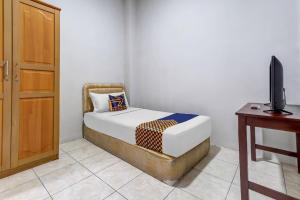 Letto o letti in una camera di Hotel O Dago Near Bandung Zoo Formerly Chatter Place