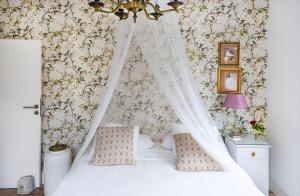 Postel nebo postele na pokoji v ubytování Grandma House in Anaga Rural Park