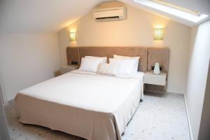 Postel nebo postele na pokoji v ubytování Mozaik Hotel + 37 fotografií