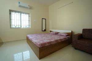 Postel nebo postele na pokoji v ubytování Bhakti Bliss Homestay - New Luxurious Pent house with AC