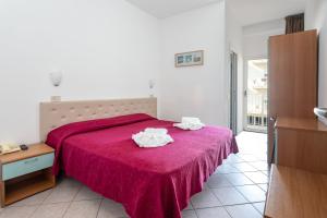 Postel nebo postele na pokoji v ubytování Hotel Blumen + 37 fotografií