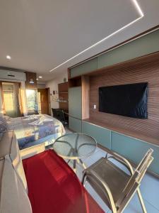 Μια τηλεόραση ή/και κέντρο ψυχαγωγίας στο Flat em Muro Alto-Porto de Galinhas-Makia Beach Experience