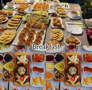 a table with many different types of food on it at RUM FANTAS BUBBLE lUXURY CAMP in Wadi Rum