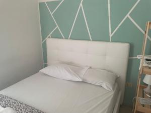Postel nebo postele na pokoji v ubytování Dama HostelBB