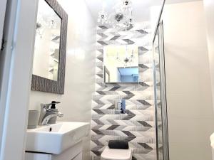Kúpeľňa v ubytovaní Apartament Starogdański 6