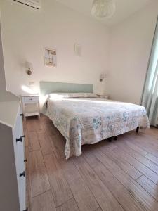 Postel nebo postele na pokoji v ubytování Il Giardino