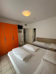 Posteľ alebo postele v izbe v ubytovaní Villaggio Hemingway - Family Aparthotel