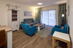 Posezení v ubytování De Pelikaan Texel Appartementen