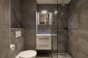 Koupelna v ubytování De Pelikaan Texel Appartementen