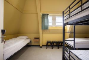 Letto o letti in una camera di CoolDocks
