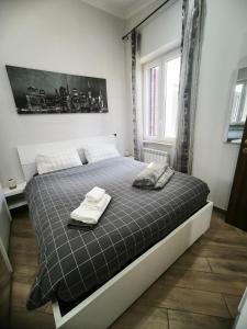 A bed or beds in a room at Casa Vacanza Giorgia 2.0