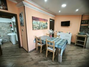 A television and/or entertainment centre at Casa Vacanza Giorgia 2.0