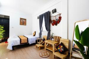 Ένα ή περισσότερα κρεβάτια σε δωμάτιο στο Casablanca Hotel Hue