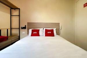 Postel nebo postele na pokoji v ubytování OYO Hotel Itarantim, São Paulo
