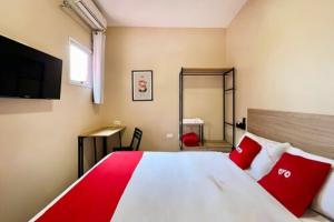 Postel nebo postele na pokoji v ubytování OYO Hotel Itarantim, São Paulo