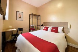 Postel nebo postele na pokoji v ubytování OYO Hotel Itarantim, São Paulo