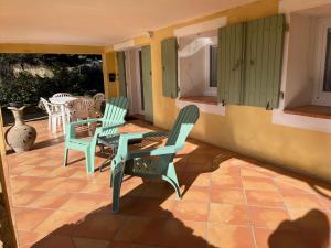 Posezení v ubytování Le rez-de-jardin de SoPat