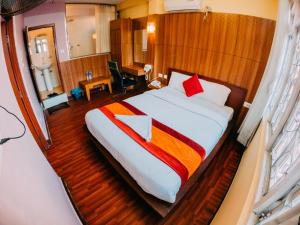 Giường trong phòng chung tại Great Doors Thamel