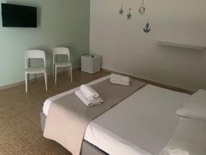 Postel nebo postele na pokoji v ubytování Dama HostelBB