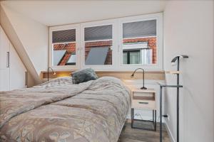 Ένα ή περισσότερα κρεβάτια σε δωμάτιο στο Apartment at the harbor