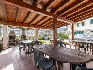 A restaurant or other place to eat at Apartment La Colombera-2 by Interhome