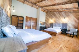 Capital O Collection O Casona De Minas Mineral del Monte客房内的一张或多张床位