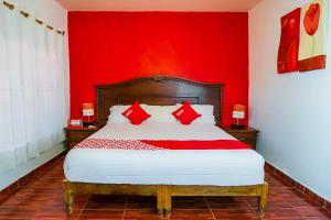 Postel nebo postele na pokoji v ubytování OYO Posada De Los Angeles, Pátzcuaro