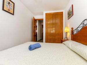 Postel nebo postele na pokoji v ubytování Apartment Oroblanc by Interhome