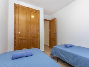 Postel nebo postele na pokoji v ubytování Apartment Oroblanc by Interhome