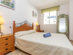 Postel nebo postele na pokoji v ubytování Apartment Oroblanc by Interhome