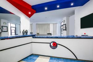 a game room with a ping pong table at Capital O Hotel Casa Blanca, Morelia in Morelia