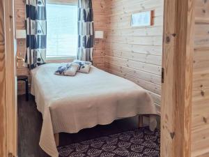 Postel nebo postele na pokoji v ubytování Holiday Home Päivänsäde 8 lapinkulta by Interhome
