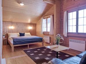 Postel nebo postele na pokoji v ubytování Chalet Wätterlücke by Interhome