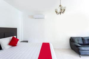 Postel nebo postele na pokoji v ubytování OYO Hotel Rio