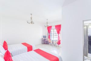 Postel nebo postele na pokoji v ubytování OYO Hotel Rio