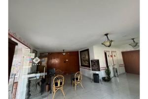 Kuchyň nebo kuchyňský kout v ubytování Capital O Gran Hotel Campestre