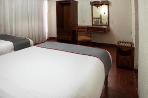Voodi või voodid majutusasutuse Collection O Hotel Mocambo, Boca del Río toas